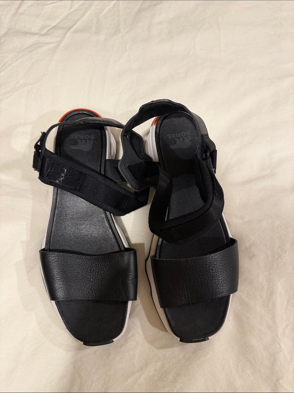 Sorel Black Women’s Sport Sandals with White Sole and Orange Heel Accent